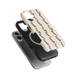 Blackberry iPhone case featuring a floral design on a cream background with a black protective layer underneath.