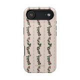Blackberry iPhone case featuring a floral pattern with roses on a light background and a black camera cutout.