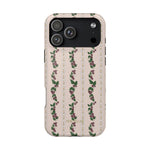 Blackberry iPhone case featuring a floral pattern with purple flowers and green leaves on a light background.