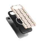 Blackberry iPhone case featuring a floral design on a cream background, layered over a black phone case.