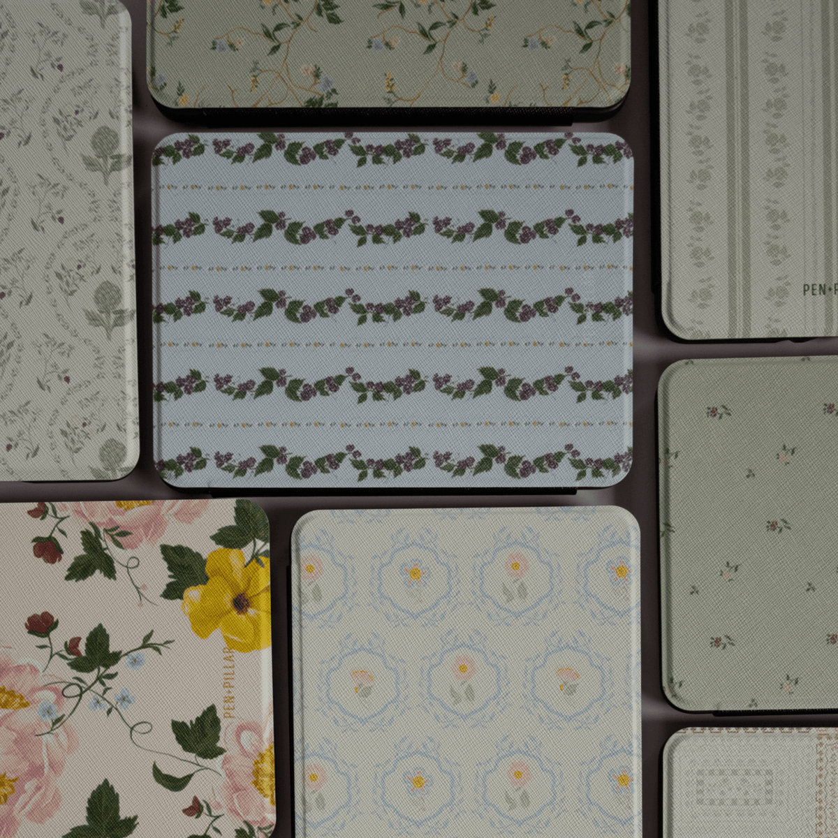 Blackberry Kindle case featuring a floral design with various patterns in pastel colors and textures.
