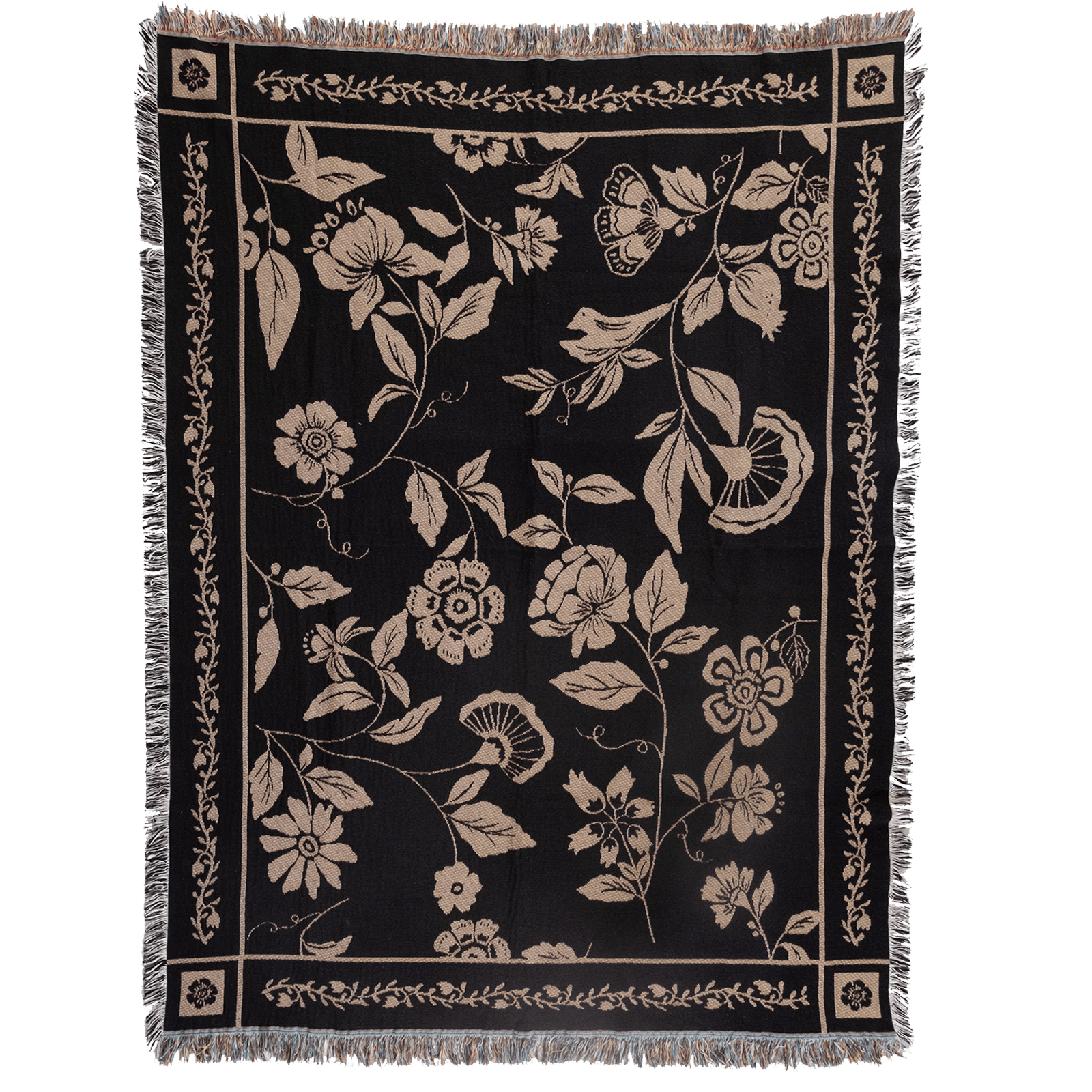 Bramble woven blanket featuring a floral design in cream on a black background with fringed edges.