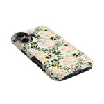 Bumblebee iPhone case featuring a floral design with bees on a light background, angled to show side buttons.