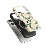 Bumblebee iPhone case featuring a floral design with bees, layered over a black and silver phone case.