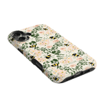 Bumblebee iPhone case featuring a floral design with bees, in soft pastel colors on a light background.