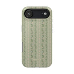 Camellia iPhone case featuring a floral pattern with green background and pink flowers, designed for protection and style.
