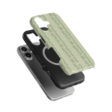 Camellia iPhone case featuring a floral design in green and pink, layered over a black and silver phone.