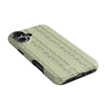 Camellia iPhone case featuring a floral pattern on a light green background with a slim profile and cutouts for buttons.