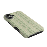 Camellia iPhone case featuring a floral pattern on a light green background with a slim profile and cutouts for buttons.
