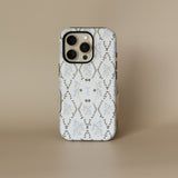 Clover personalized iPhone case featuring a floral design in blue and gray with a monogrammed letter T.
