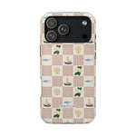 Coastal iPhone case featuring a pattern of sailboats, fish, and greenery on a checkered background.