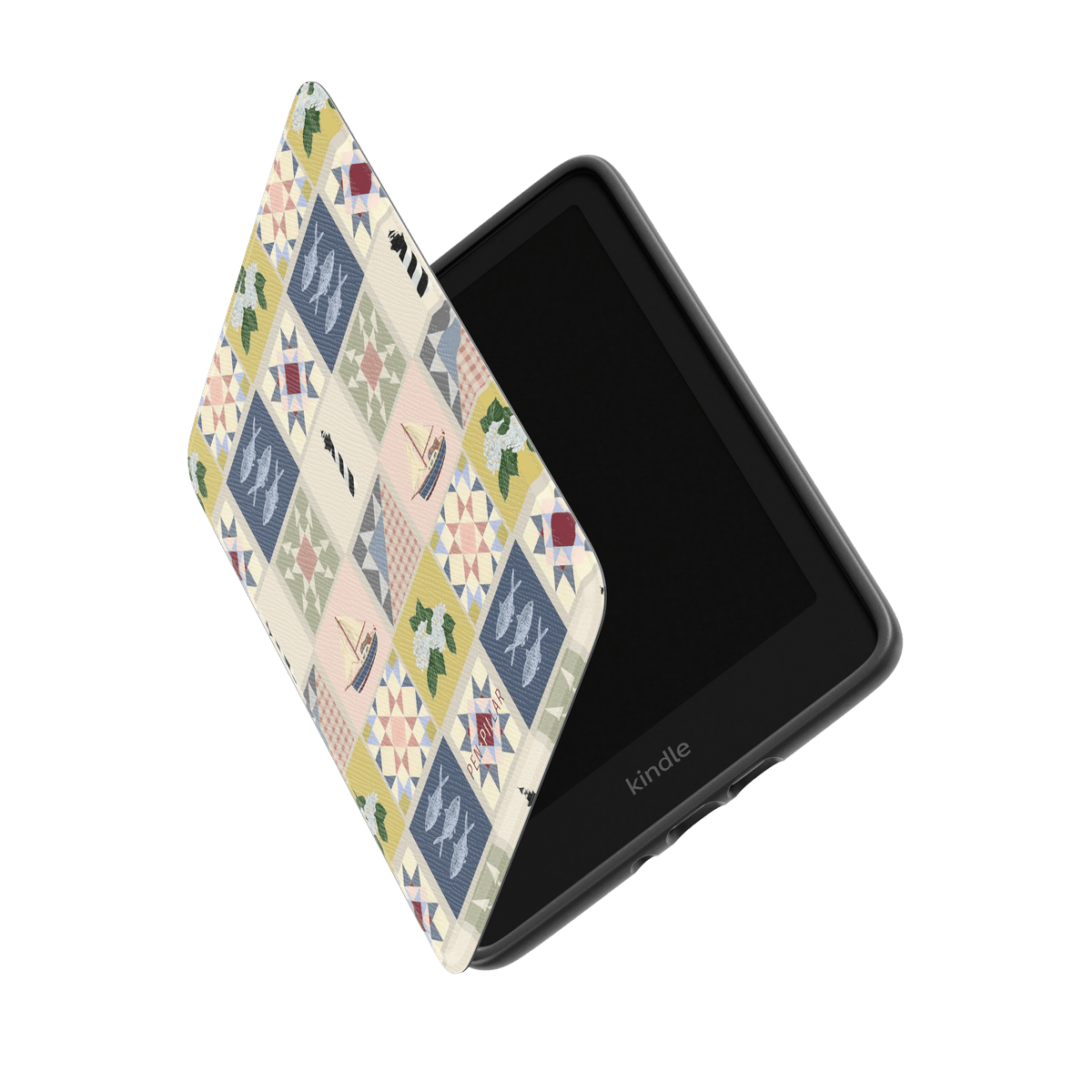 Black Kindle in a case with a quilted pattern of lighthouses, sailboats, and fish in blue, tan, and green.