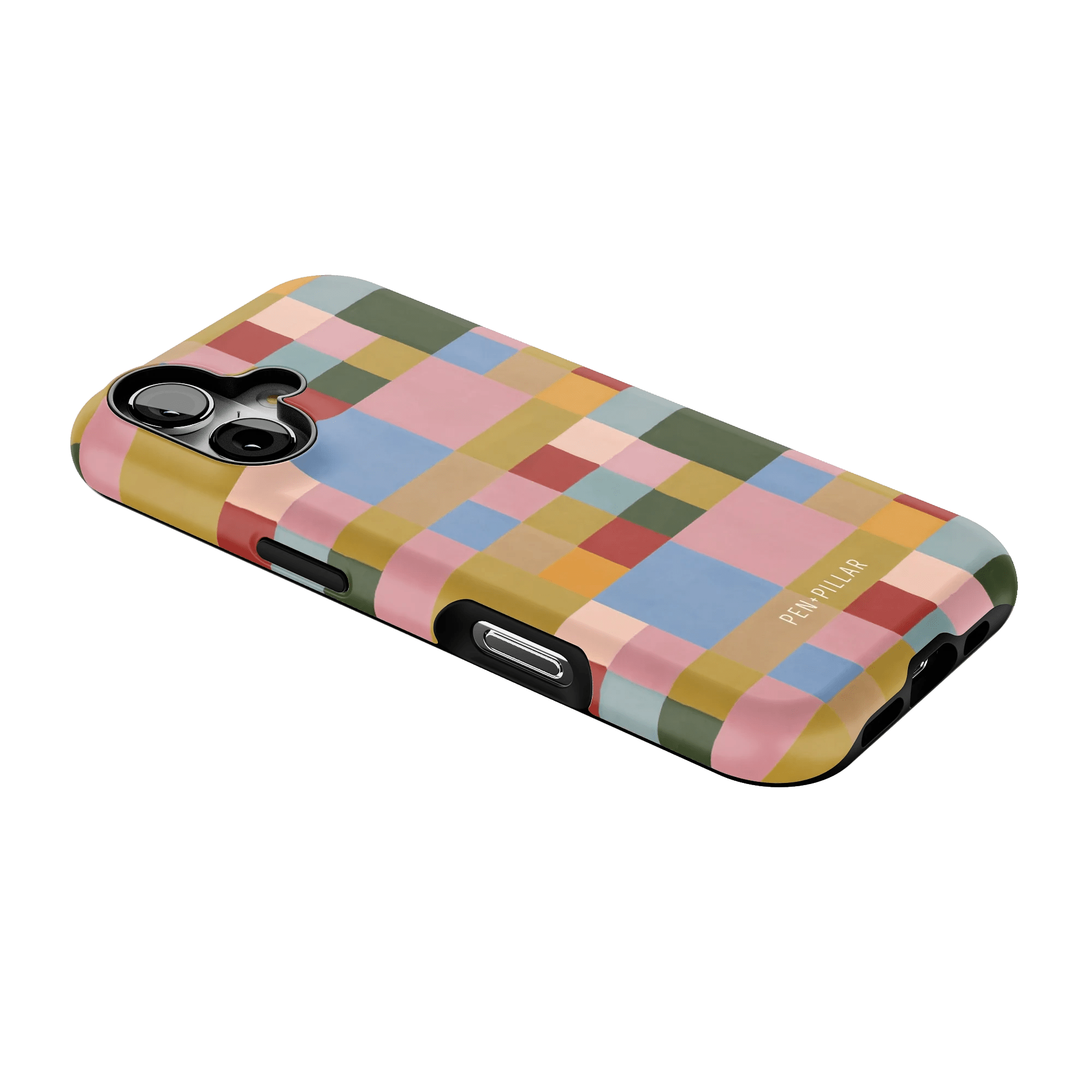 Colorblock iPhone case featuring a vibrant patchwork design in pastel and earthy tones, angled view on a green background.