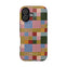 Colorblock iPhone case featuring a geometric pattern in pastel colors, including green, pink, and blue.