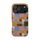 Colorblock iPhone case featuring a geometric pattern in pastel colors, including pink, green, and blue.