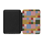 Colorblock Kindle case featuring a geometric pattern in pastel and earthy tones, with a black interior.