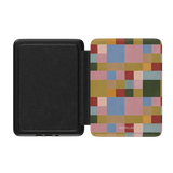 Colorblock Kindle case featuring a geometric pattern in pastel and earthy tones, with a black interior.
