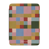 Colorblock Kindle case featuring a geometric pattern in various colors including green, pink, blue, and yellow.
