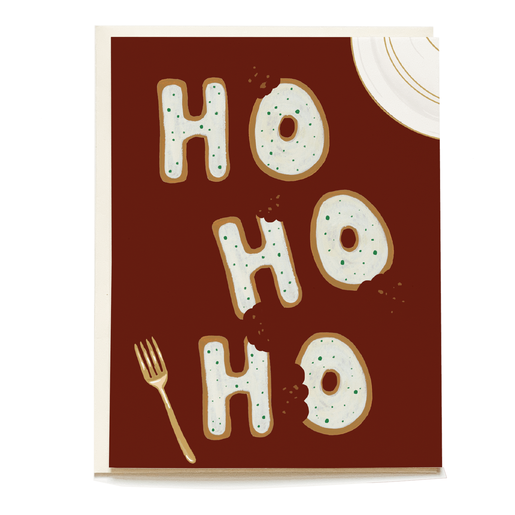 Holiday card featuring cookies shaped as letters spelling "HO HO HO" on a brown background with a fork and plate.