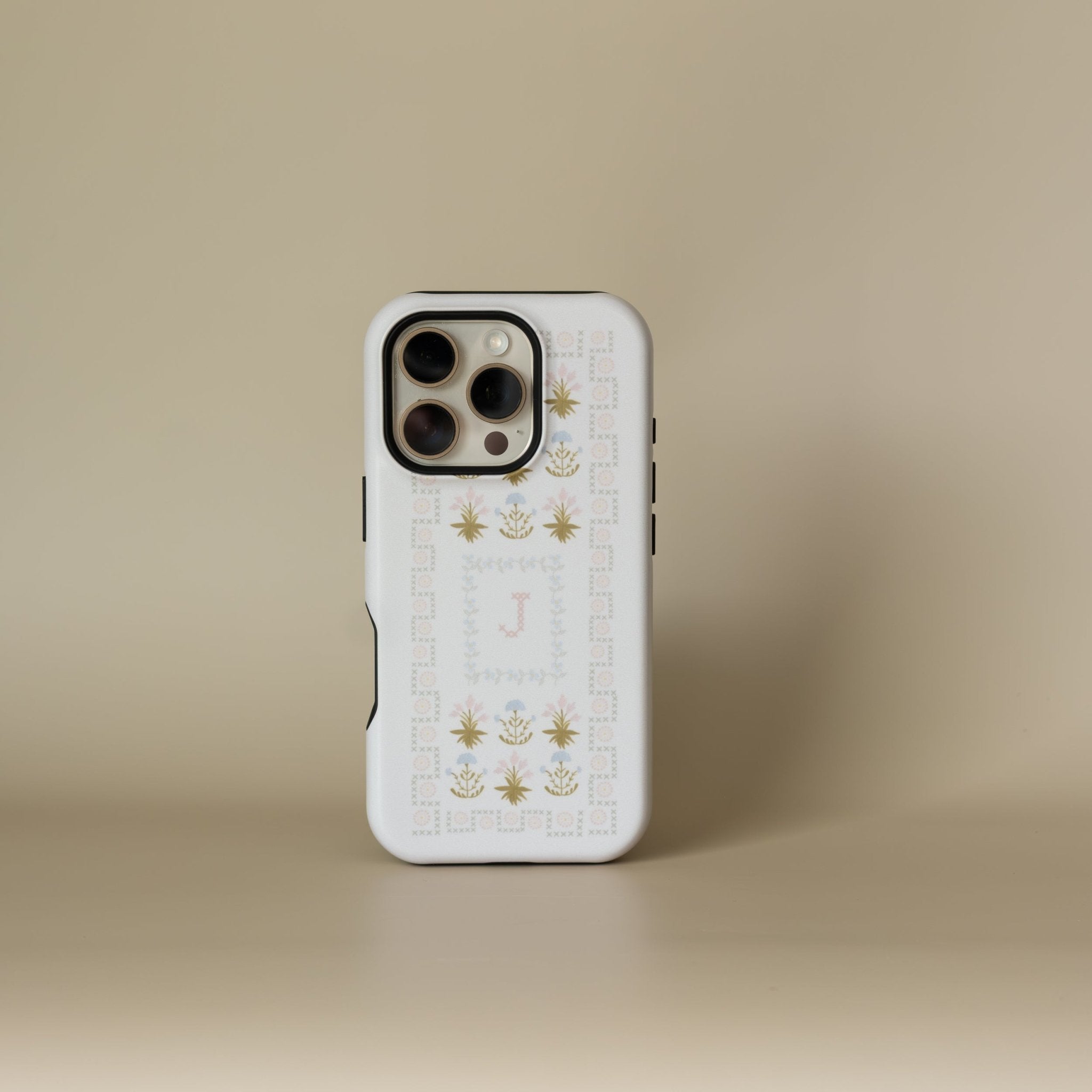 Cora personalized iPhone case featuring a floral design and initial "J" on a white background.