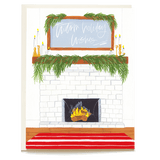 Cozy home holiday card featuring a fireplace, greenery, and the text "Warm holiday wishes" on a decorative mantle.