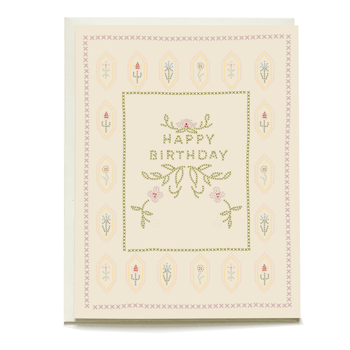 Cross-stitch birthday card featuring "Happy Birthday" text with floral designs and a pastel color scheme.