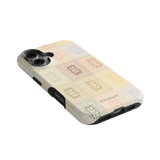 Curio iPhone case featuring a textured design with pastel squares in yellow, green, and blue on a white background.