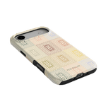 Curio iPhone case featuring a textured pattern in pastel colors on a light background with a black edge.