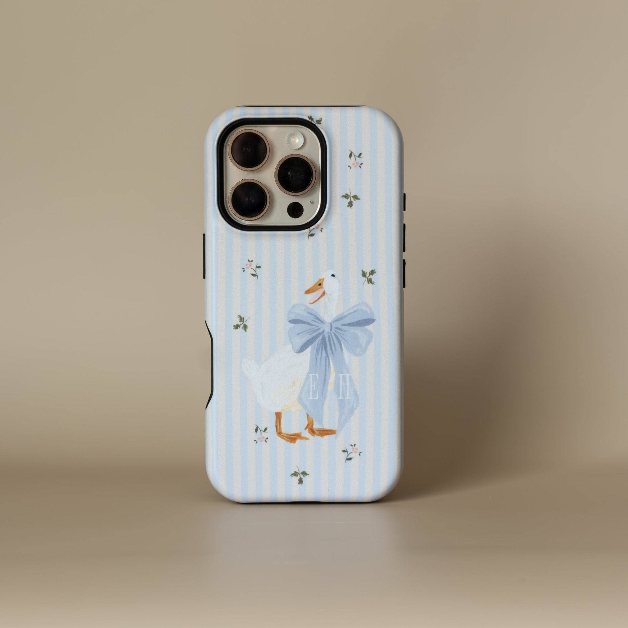 Dainty Duck personalized iPhone case with a blue striped design and a duck illustration wearing a bow.