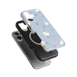 Ducks iPhone case featuring a light blue background with white ducks and pink flowers, shown from multiple angles.