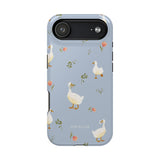 Ducks iPhone case featuring a light blue background with illustrated ducks and floral accents.