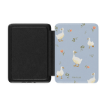 Ducks Kindle case with a light blue background and white ducks among floral patterns, open to show interior.
