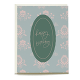 Eclipse birthday card featuring a floral design in pink and green with "happy birthday" text in elegant script.