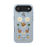 Farmland iPhone case featuring a blue background with floral designs, animals, and farm-themed illustrations.