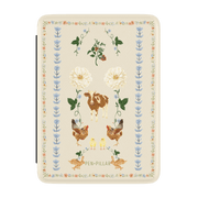 Cream fabric Kindle case featuring a cow, chickens, and rabbits with floral borders and the text PEN+PILLAR.