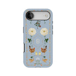 Farmland personalized phone case featuring floral and chicken designs on a light blue background with a monogrammed letter B.