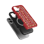 Fiona iPhone case in red with floral design, layered over black and silver cases on a green background.