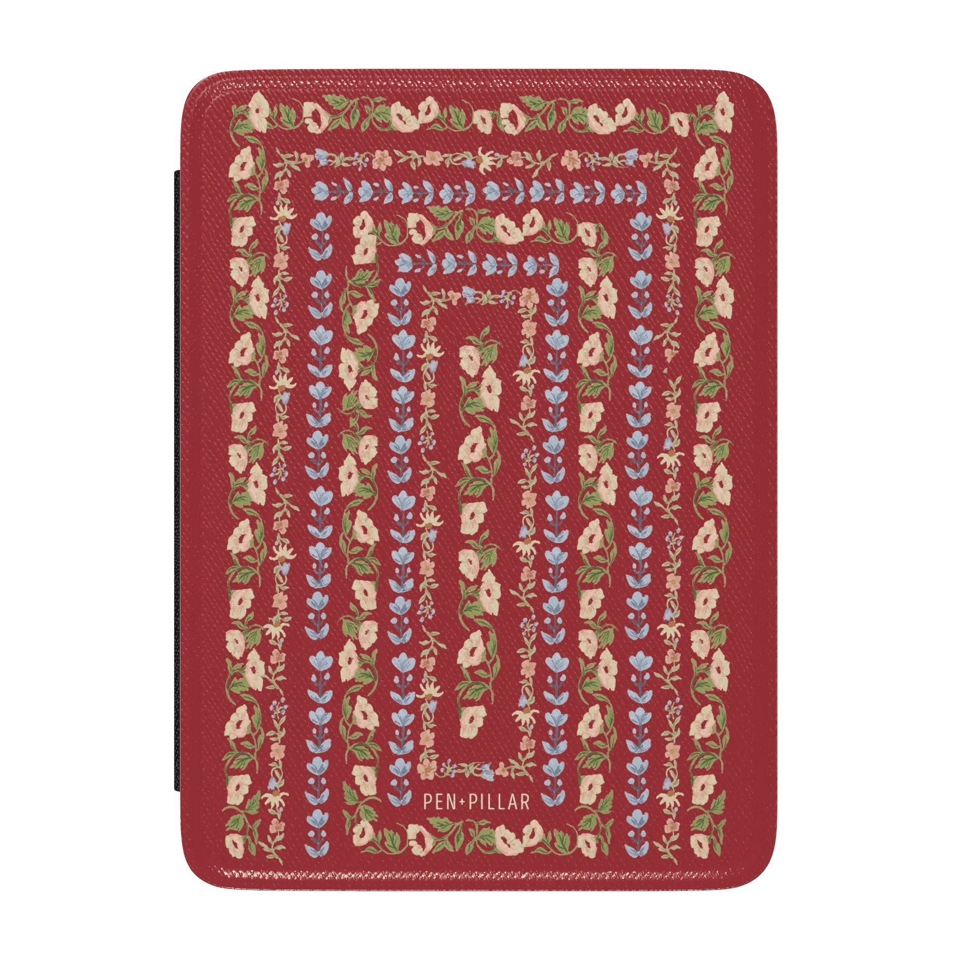 Fiona Kindle case featuring a red background with floral patterns in pink, blue, and green.