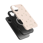Forage iPhone case featuring a light pink floral design with small flowers and a black case underneath.