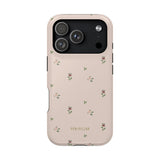 Forage iPhone case in soft pink with small floral patterns and a matte finish, designed for iPhone models.