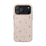 Forage iPhone case in soft pink with small floral patterns and black camera cutout.