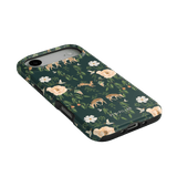Forest iPhone case featuring a dark green background with floral patterns and deer illustrations.