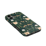 Forest iPhone case featuring a dark green background with floral patterns and deer illustrations.