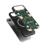 Forest iPhone case featuring a floral design with deer, flowers, and greenery on a dark green background.