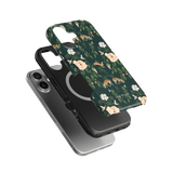 Forest iPhone case featuring a floral design with deer, set against a dark green background.