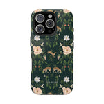 Forest iPhone case featuring a dark green background with floral and deer patterns.