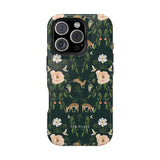 Forest iPhone case featuring a dark green background with floral and deer patterns.