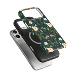 Forest iPhone case featuring floral and deer patterns on a dark green background, layered over two other phone cases.