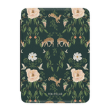 Forest Kindle case featuring floral and animal designs in green, with deer, flowers, and butterflies.