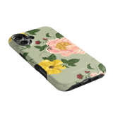 Garden Rose iPhone case featuring pink and yellow floral designs on a light green background.